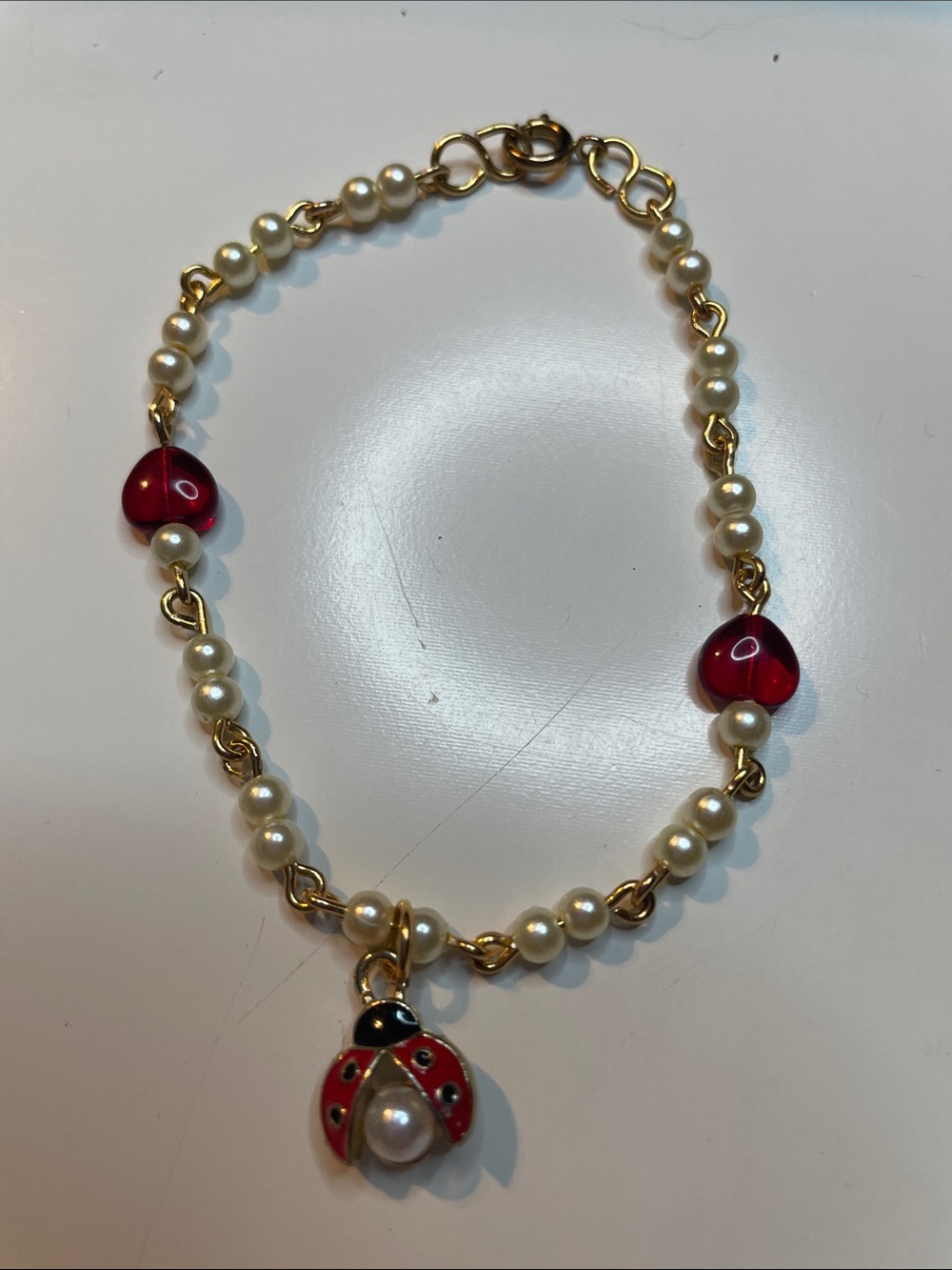 Faux Pearl Bead Bracelet with Red Ladybug Charm
